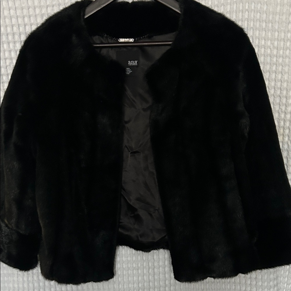 Brand new Elegant Black Faux Fur Jacket with pockets.